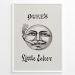Ladda upp bild till gallerivisning, Framed Duke’s Little Joker vintage poster with detailed moon face illustration smoking a cigarette on a beige textured background.
