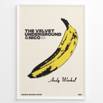 Ladda upp bild till gallerivisning, Framed Andy Warhol Banana art poster featuring The Velvet Underground &amp; Nico text on a beige background.
