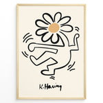 Ladda upp bild till gallerivisning, Framed Keith Haring-style poster showing a black outlined dancing figure with a daisy flower head on a beige background.
