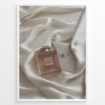 Ladda upp bild till gallerivisning, Fashion Plakat | Gabrielle Chanel Perfume on Silk with Envelope – Luxury Flat Lay Print Plakaty.dk | Gabrielle Chanel Essence perfume bottle and Chanel envelope placed on soft ivory silk fabric in a luxury flat lay composition.
