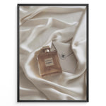 Ladda upp bild till gallerivisning, Fashion Plakat | Gabrielle Chanel Perfume on Silk with Envelope – Luxury Flat Lay Print Plakaty.dk | Gabrielle Chanel Essence perfume bottle and Chanel envelope placed on soft ivory silk fabric in a luxury flat lay composition.
