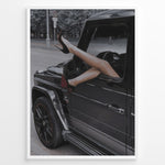 Ladda upp bild till gallerivisning, Fashion Plakat | Luxury Escape: Legs in High Heels Through Mercedes G-Wagon Window Plakaty.dk | Woman&#39;s legs in high heels sticking out of a Mercedes-Benz G-Wagon window in an urban street scene.
