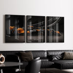 Ladda upp bild till gallerivisning, Triptych wall art plakat of the McLaren F1 Team MCL38 Formula 1 car displayed in a stylish living room with black leather furniture.
