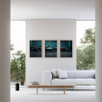 Ladda upp bild till gallerivisning, Triptych wall art plakat of the Mercedes-AMG Petronas F1 Team W15 Formula 1 car displayed in a modern living room with black leather furniture.
