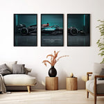 Ladda upp bild till gallerivisning, Triptych wall art plakat of the Mercedes-AMG Petronas F1 Team W15 Formula 1 car displayed in a modern living room with black leather furniture.
