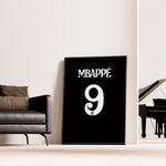 Ladda upp bild till gallerivisning, Kylian Mbappé Fodbold Plakat | Til Real Madrid Fans | Denne plakat viser Kylian Mbappé i en ikonisk Real Madrid trøje, klar til at score mål. Perfekt til fodboldfans og specielt Real Madrid entusiaster.
