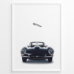 Ladda upp bild till gallerivisning, Framed minimalist poster of a black Jaguar E-Type classic sports car front view with the Jaguar leaping logo above on a white background.
