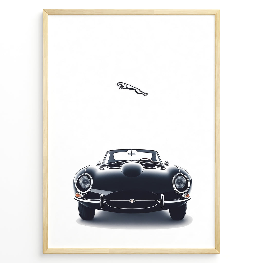 Framed minimalist poster of a black Jaguar E-Type classic sports car front view with the Jaguar leaping logo above on a white background.