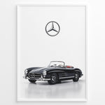 Ladda upp bild till gallerivisning, Framed minimalist poster featuring a black Mercedes-Benz 300SL Roadster convertible with red seats and Mercedes logo above on white background.
