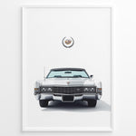 Ladda upp bild till gallerivisning, Front-facing illustration of a white classic convertible car with an emblem above in a minimalist framed poster.
