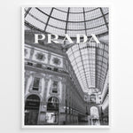Ladda upp bild till gallerivisning, Fashion Plakat | Prada Boutique in Galleria Vittorio Emanuele II – Milan, Italy Plakaty.dk | Black and white photo of the Prada store inside the Galleria Vittorio Emanuele II in Milan, showcasing ornate architecture and a large glass-domed ceiling.
