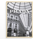 Ladda upp bild till gallerivisning, Fashion Plakat | Prada Boutique in Galleria Vittorio Emanuele II – Milan, Italy Plakaty.dk | Black and white photo of the Prada store inside the Galleria Vittorio Emanuele II in Milan, showcasing ornate architecture and a large glass-domed ceiling.
