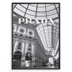 Ladda upp bild till gallerivisning, Fashion Plakat | Prada Boutique in Galleria Vittorio Emanuele II – Milan, Italy Plakaty.dk | Black and white photo of the Prada store inside the Galleria Vittorio Emanuele II in Milan, showcasing ornate architecture and a large glass-domed ceiling.
