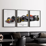 Ladda upp bild till gallerivisning, Triptych wall art plakat of the Red Bull Racing RB20 Formula 1 car displayed in a contemporary living room with a black leather sofa and modern furnishings.
