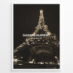 Ladda upp bild till gallerivisning, Fashion Plakat | Saint Laurent Eiffel Tower Night View – Paris Fashion Wall Art Plakaty.dk | Illuminated Eiffel Tower at night with &quot;Saint Laurent Paris&quot; logo centered in white text.
