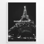 Ladda upp bild till gallerivisning, Fashion Plakat | Saint Laurent Eiffel Tower Poster – Black &amp; White Paris Fashion Print Plakaty.dk | Black and white photo of the Eiffel Tower illuminated at night with “Saint Laurent Paris” text overlay, capturing the essence of French fashion and elegance.

