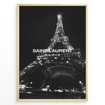 Ladda upp bild till gallerivisning, Fashion Plakat | Saint Laurent Eiffel Tower Poster – Black &amp; White Paris Fashion Print Plakaty.dk | Black and white photo of the Eiffel Tower illuminated at night with “Saint Laurent Paris” text overlay, capturing the essence of French fashion and elegance.
