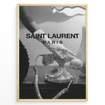 Ladda upp bild till gallerivisning, Fashion Plakat | Saint Laurent Glamour Art Featuring Glitter Phone and Elegant Hand Plakaty.dk | Black-and-white image of a sparkling vintage rotary phone being held by a glittering, elegant hand, with &quot;SAINT LAURENT PARIS&quot; overlaid in bold text.
