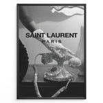 Ladda upp bild till gallerivisning, Fashion Plakat | Saint Laurent Glamour Art Featuring Glitter Phone and Elegant Hand Plakaty.dk | Black-and-white image of a sparkling vintage rotary phone being held by a glittering, elegant hand, with &quot;SAINT LAURENT PARIS&quot; overlaid in bold text.
