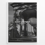 Ladda upp bild till gallerivisning, Fashion Plakat | Saint Laurent Paris – Architectural Elegance in Monochrome Plakaty.dk | Black and white photo of classical architecture with arches and columns, overlaid with the Saint Laurent Paris logo, conveying elegance and luxury.
