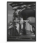 Ladda upp bild till gallerivisning, Fashion Plakat | Saint Laurent Paris – Architectural Elegance in Monochrome Plakaty.dk | Black and white photo of classical architecture with arches and columns, overlaid with the Saint Laurent Paris logo, conveying elegance and luxury.
