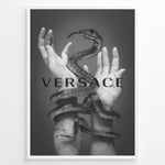 Ladda upp bild till gallerivisning, Fashion Plakat | Versace-Inspired Art Featuring Serpent and Marble Hands Plakaty.dk | Black-and-white image of a snake wrapped around two upward-reaching marble-textured hands, with the word &quot;VERSACE&quot; overlaid in bold, semi-blurred text.
