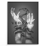 Ladda upp bild till gallerivisning, Fashion Plakat | Versace-Inspired Art Featuring Serpent and Marble Hands Plakaty.dk | Black-and-white image of a snake wrapped around two upward-reaching marble-textured hands, with the word &quot;VERSACE&quot; overlaid in bold, semi-blurred text.
