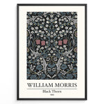 Ladda upp bild till gallerivisning, Framed William Morris Black Thorn 1892 art print plakat with detailed white and red flowers and blue-green leaves on a black background.
