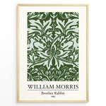 Ladda upp bild till gallerivisning, Framed William Morris Brother Rabbit 1882 art print plakat with detailed green foliage and rabbit pattern on a pale background.
