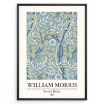 Ladda upp bild till gallerivisning, William Morris Sweet Briar 1887 botanical floral pattern art print with blue and beige leaves and flowers in black frame plakat.
