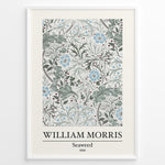 Ladda upp bild till gallerivisning, Framed William Morris Seaweed 1866 art print plakat featuring intricate seaweed-inspired floral and leaf motifs in blue and green on a cream background.
