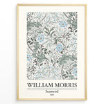Ladda upp bild till gallerivisning, Framed William Morris Seaweed 1866 art print plakat featuring intricate seaweed-inspired floral and leaf motifs in blue and green on a cream background.
