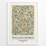 Ladda upp bild till gallerivisning, Framed William Morris Honeysuckle 1885 art print plakat featuring intertwining green leaves and orange honeysuckle flowers on a cream background.
