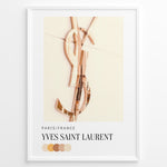 Ladda upp bild till gallerivisning, Fashion Plakat | Yves Saint Laurent Paris – Rose Gold Emblem Poster Plakaty.dk | Rose gold Yves Saint Laurent logo on a soft beige background with a neutral color palette and Paris/France label beneath.
